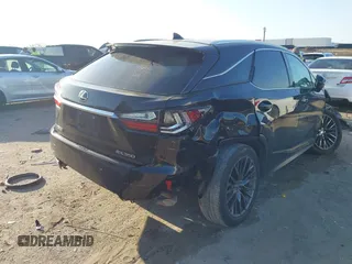 2016 Lexus RX 350 with VIN 2T2BZMCAXGC047428, listed as a IAAI auction lot 41992254 with 233,391 mi miles and . Bid and sale history available at DreamBid. Image 4.