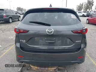 2022 Mazda CX-5 2.5 S Premium Plus Package with VIN JM3KFBEM1N0523105, listed as a IAAI auction lot 41730897 with 64,008 mi miles. Bid and sale history available at carsss.com. Image 16.
