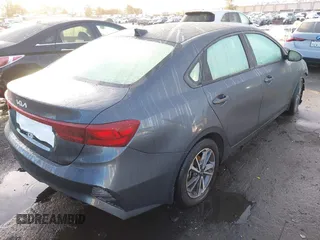 2023 Kia Forte LXS with VIN 3KPF24AD7PE536653, listed as a IAAI auction lot 41562883 with 32,700 mi miles and . Bid and sale history available at DreamBid. Image 4.