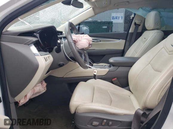 2017 Cadillac XT5 Luxury FWD with VIN 1GYKNBRS3HZ323826, listed as a Copart auction lot 58239735 with 67,416 mi miles and Salvage title. Bid and sale history available at DreamBid. Image 7.