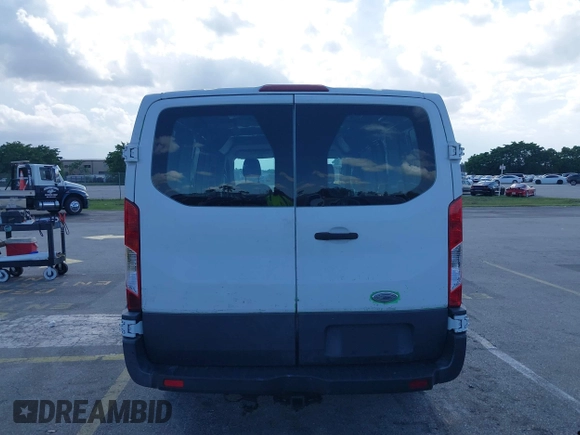 2015 Ford Transit Cargo with VIN 1FTYR1ZM3FKA82081, listed as a IAAI auction lot 42475225 with 255,716 mi miles and . Bid and sale history available at DreamBid. Image 16.