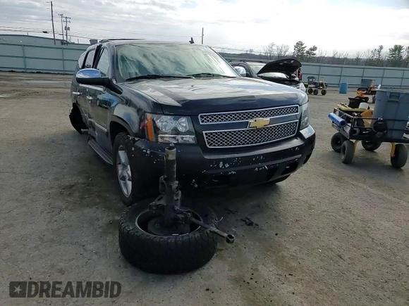 2012 Chevrolet Tahoe LTZ with VIN 1GNSKCE08CR322969, listed as a Copart auction lot 50604555 with 165,190 mi miles and Salvage title. Bid and sale history available at DreamBid. Image 12.