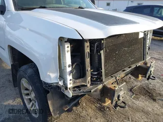 2014 Chevrolet Silverado 1500 LT with VIN 1GCVKREC2EZ361322, listed as a IAAI auction lot 41362836 with 199,684 mi miles and . Bid and sale history available at DreamBid. Image 18.