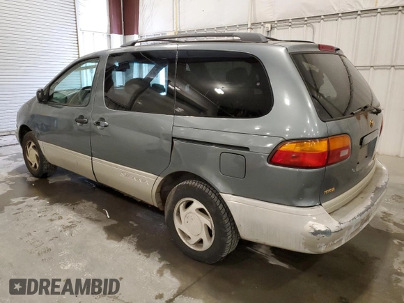 1999 Toyota Sienna LE with VIN 4T3ZF13C2XU123953, listed as a Copart auction lot 52193705 with 174,886 mi miles and Clean Title. Bid and sale history available at carsss.com. Image 2.