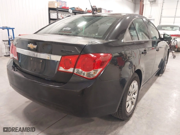 2014 Chevrolet Cruze LS with VIN 1G1PA5SH2E7340849, listed as a IAAI auction lot 41945025 with 107,425 mi miles. Bid and sale history available at carsss.com. Image 4.