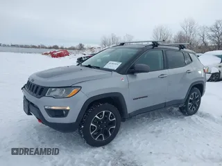 2020 Jeep Compass Trailhawk with VIN 3C4NJDDB1LT203329, listed as a IAAI auction lot 41301931 with 79,035 mi miles and . Bid and sale history available at carsss.com. Image 2.