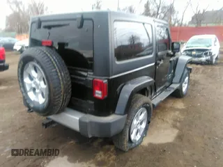 2014 Jeep Wrangler Sahara with VIN 1C4AJWBG9EL161712, listed as a IAAI auction lot 41839193 with 68,318 mi miles and . Bid and sale history available at DreamBid. Image 4.