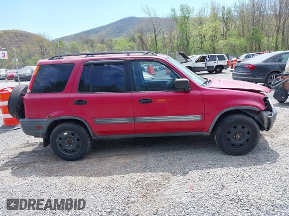 2000 Honda CR-V LX with VIN JHLRD184XYC010847, listed as a IAAI auction lot 42080100 with 256,678 mi miles and . Bid and sale history available at DreamBid. Image 13.