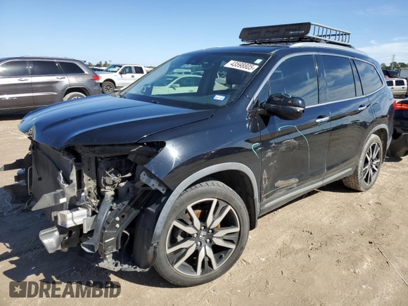 2019 Honda Pilot Touring 7-Passenger z VIN 5FNYF5H69KB019903, wystawiony jako Copart lot #43598805 z przebiegiem 144 486 mil mil oraz Szkoda całkowita • Salvage title. Historia ofert i sprzedaży dostępna na DreamBid. Obrazek 1.