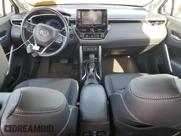 2022 Toyota Corolla Cross XLE с VIN 7MUDAAAG0NV030559, выставлен на аукционе Copart как лот 54075315 с пробегом 28 557 миль миль и Списание • Salvage title. История ставок и продаж доступна на DreamBid. Изображение 8.