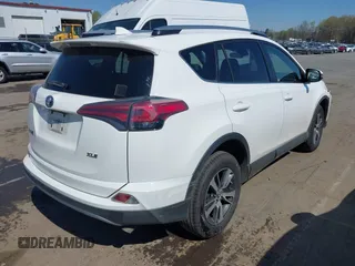 2017 Toyota RAV4 XLE with VIN JTMWFREV8HD107495, listed as a IAAI auction lot 41859546 with 150,503 mi miles and . Bid and sale history available at DreamBid. Image 4.