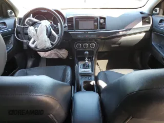 2015 Mitsubishi Lancer Evolution MR z VIN JA32W5FV5FU006111, wystawiony jako Copart lot #68985683 z przebiegiem 54 774 mil mil oraz . Historia ofert i sprzedaży dostępna na DreamBid. Obrazek 8.