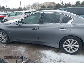2015 Infiniti Q50 Premium with VIN JN1BV7AR0FM396192, listed as a IAAI auction lot 41564677 with 210,460 mi miles and . Bid and sale history available at DreamBid. Image 15.