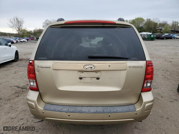 2008 Hyundai Entourage GLS with VIN KNDMC233886055461, listed as a Copart auction lot 52511165 with 215,885 mi miles and Salvage Title. Bid and sale history available at carsss.com. Image 6.