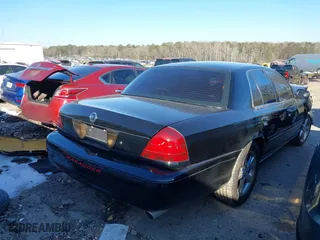 2003 Mercury Marauder with VIN 2MEHM75V33X640454, listed as a IAAI auction lot 41341810 with 173,660 mi miles. Bid and sale history available at carsss.com. Image 4.