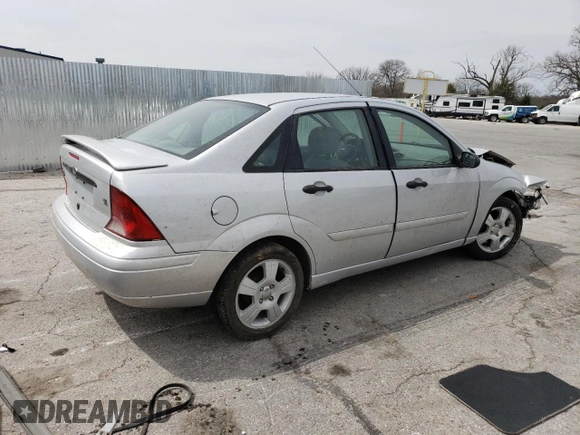 2004 Ford Focus SE with VIN 1FAFP34344W113759, listed as a Copart auction lot 51386335 with 148,267 mi miles and Salvage title. Bid and sale history available at DreamBid. Image 3.