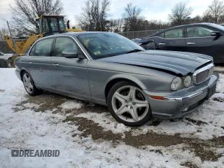 2006 Jaguar XJ with VIN SAJWA79B06SH07721, listed as a Copart auction lot 87851345 with 93,004 mi miles and Salvage Title. Bid and sale history available at carsss.com. Image 4.