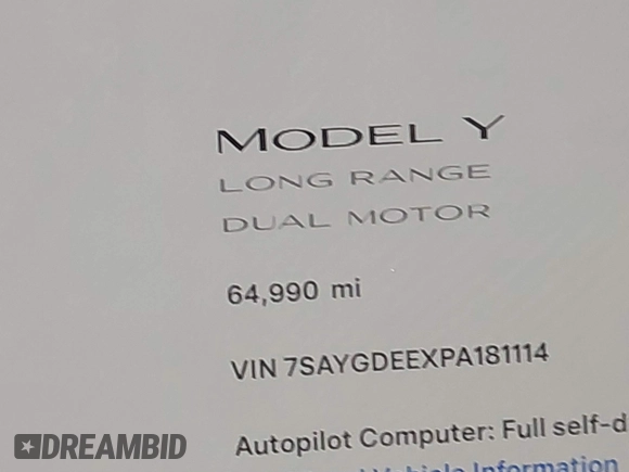 2023 Tesla Model Y Long Range z VIN 7SAYGDEEXPA181114, wystawiony jako IAAI lot #41564617 z przebiegiem 64 990 mil mil oraz . Historia ofert i sprzedaży dostępna na DreamBid. Obrazek 16.