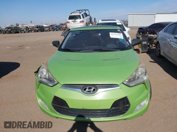 2012 Hyundai Veloster w/Gray Int z VIN KMHTC6AD5CU040673, wystawiony jako IAAI lot #41491429 z przebiegiem Nie podano mil oraz . Historia ofert i sprzedaży dostępna na DreamBid. Obrazek 11.
