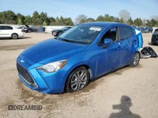 2019 Toyota Yaris L z VIN 3MYDLBYV0KY520990, wystawiony jako Copart lot #53995465 z przebiegiem 57 679 mil mil oraz Szkoda całkowita • Salvage title. Historia ofert i sprzedaży dostępna na DreamBid. Obrazek 1.