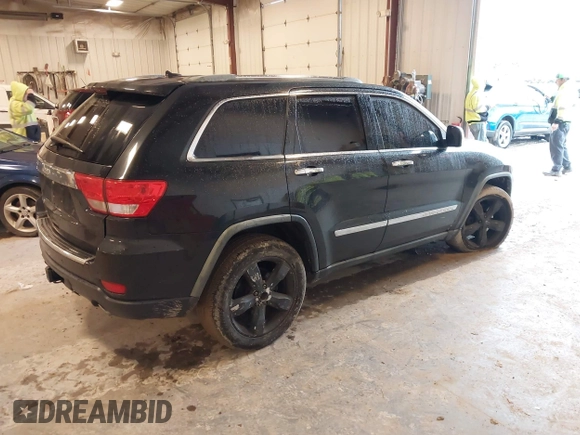 2011 Jeep Grand Cherokee Limited with VIN 1J4RR5GTXBC586647, listed as a IAAI auction lot 42332615 with 151,377 mi miles and . Bid and sale history available at DreamBid. Image 4.