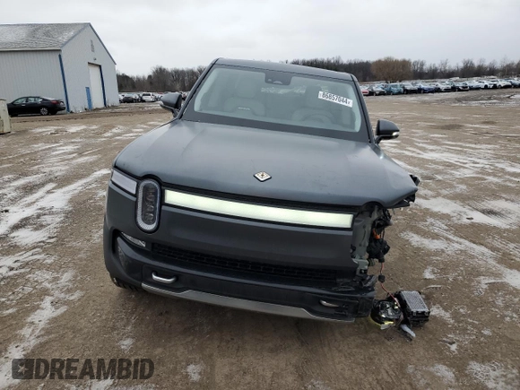 2024 Rivian R1T Adventure with VIN 7FCTGBAA8RN034399, listed as a Copart auction lot 86857044 with 8,176 mi miles and Salvage Title. Bid and sale history available at carsss.com. Image 5.