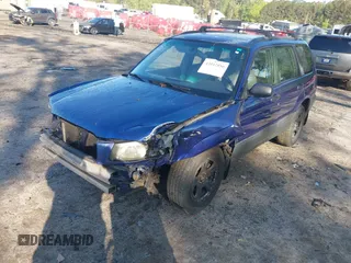 2003 Subaru Forester X with VIN JF1SG63613H743804, listed as a IAAI auction lot 42012850 with 266,100 mi miles. Bid and sale history available at carsss.com. Image 18.