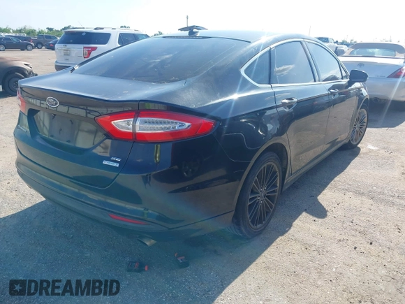 2014 Ford Fusion SE with VIN 3FA6P0HD4ER390773, listed as a IAAI auction lot 42088373 with 265,001 mi miles and . Bid and sale history available at DreamBid. Image 4.