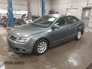 2014 Volkswagen Jetta TDI w/Premium with VIN 3VWLL7AJ4EM425825, listed as a IAAI auction lot 41519621 with 154,486 mi miles and . Bid and sale history available at DreamBid. Image 2.