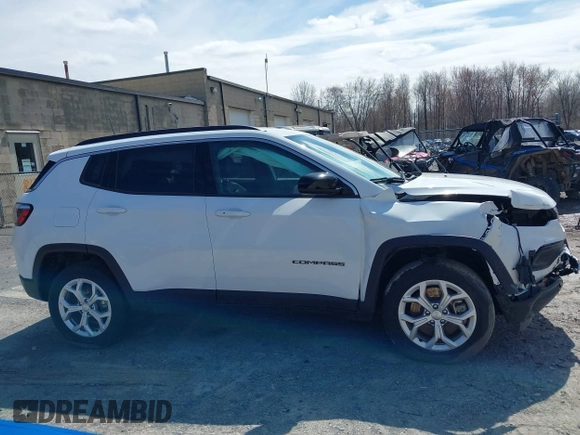 2024 Jeep Compass Latitude with VIN 3C4NJDBN5RT109413, listed as a IAAI auction lot 41987069 with 19,118 mi miles and . Bid and sale history available at DreamBid. Image 14.