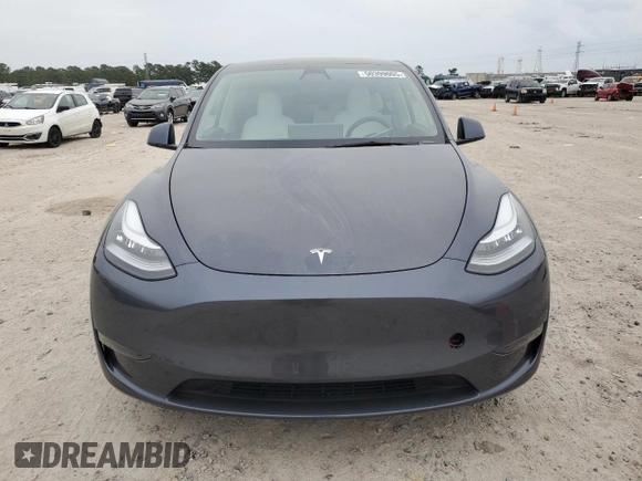 2022 Tesla Model Y Long Range with VIN 7SAYGDEE1NF315198, listed as a Copart auction lot 50399005 with 33,357 mi miles and Salvage Title. Bid and sale history available at DreamBid. Image 5.