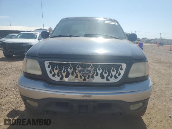 2001 Ford F-150 XL with VIN 1FTRX18L71NA27627, listed as a Copart auction lot 64190715 with 105,503 mi miles and Salvage title. Bid and sale history available at DreamBid. Image 5.