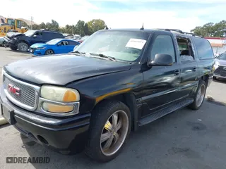 2004 GMC Yukon XL Denali with VIN 1GKFK66U34J125239, listed as a IAAI auction lot 40566893 with 1 mi miles. Bid and sale history available at carsss.com. Image 2.