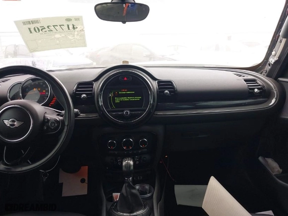 2016 MINI Cooper Clubman with VIN WMWLN5C56G2E30309, listed as a IAAI auction lot 41772501 with 67,584 mi miles. Bid and sale history available at carsss.com. Image 17.