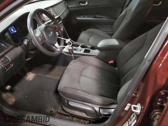 2017 Kia Optima LX z VIN 5XXGT4L3XHG142837, wystawiony jako Copart lot #55059965 z przebiegiem 135 651 mil mil oraz Szkoda całkowita • Salvage title. Historia ofert i sprzedaży dostępna na DreamBid. Obrazek 7.