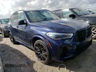 2021 BMW X5 M z VIN 5YMJU0C02M9E48899, wystawiony jako Copart lot #62313822 z przebiegiem 18 708 mil mil oraz . Historia ofert i sprzedaży dostępna na DreamBid. Obrazek 1.