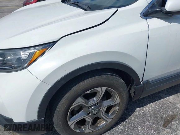 2019 Honda CR-V EX with VIN 5J6RW1H51KA007719, listed as a IAAI auction lot 41985574 with 58,696 mi miles. Bid and sale history available at carsss.com. Image 6.