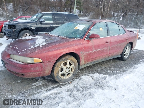 1999 Oldsmobile Intrigue GL z VIN 1G3WS52KXXF335273, wystawiony jako IAAI lot #41624543 z przebiegiem 106 606 mil mil oraz . Historia ofert i sprzedaży dostępna na DreamBid. Obrazek 2.