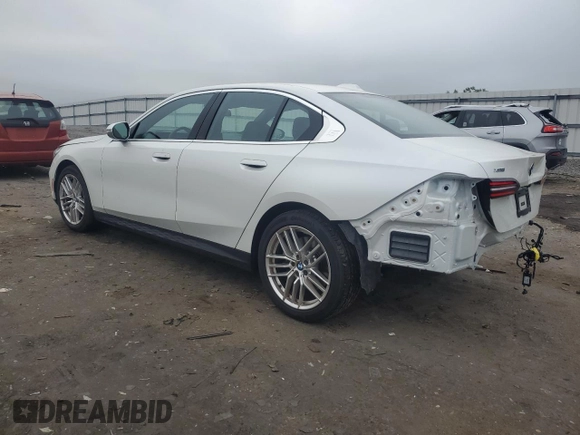 2024 BMW 5 Series 540i xDrive with VIN WBA63FJ01RCR67129, listed as a Copart auction lot 62095995 with 5,075 mi miles and Salvage title. Bid and sale history available at DreamBid. Image 2.