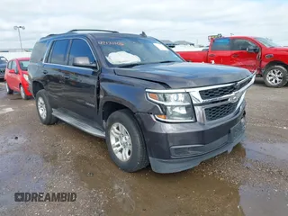 2015 Chevrolet Tahoe LT z VIN 1GNSCBKC2FR632173, wystawiony jako IAAI lot #42135105 z przebiegiem 150 033 mil mil oraz . Historia ofert i sprzedaży dostępna na DreamBid. Obrazek 1.