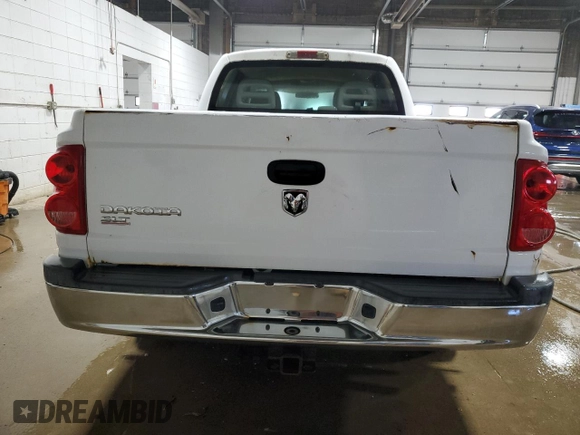2005 Dodge Dakota SLT z VIN 1D7HW48K15S245809, wystawiony jako Copart lot #76278454 z przebiegiem 213 993 mil mil oraz Czysty tytuł • Clean title. Historia ofert i sprzedaży dostępna na DreamBid. Obrazek 6.