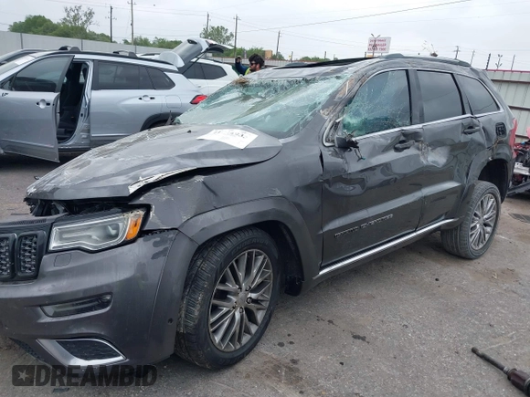 2018 Jeep Grand Cherokee Summit with VIN 1C4RJFJT1JC370907, listed as a IAAI auction lot 41944933 with 110,597 mi miles and . Bid and sale history available at DreamBid. Image 2.
