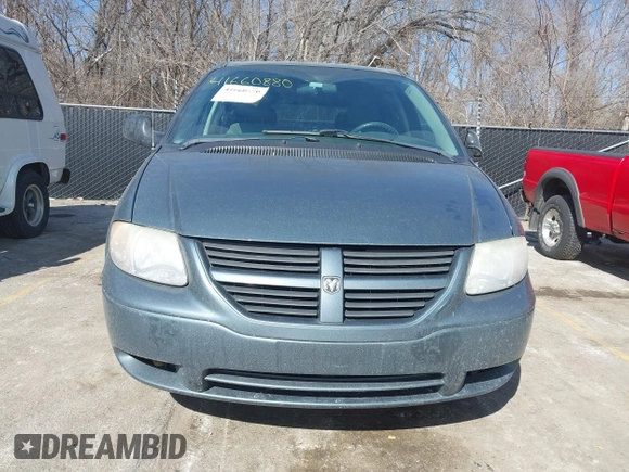2007 Dodge Caravan SXT with VIN 1D4GP45R57B237884, listed as a IAAI auction lot 41660880 with 120,513 mi miles and . Bid and sale history available at DreamBid. Image 6.