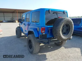 2016 Jeep Wrangler Unlimited 75th Anniversary with VIN 1C4BJWEG7GL179001, listed as a IAAI auction lot 42030735 with 123,681 mi miles. Bid and sale history available at carsss.com. Image 3.