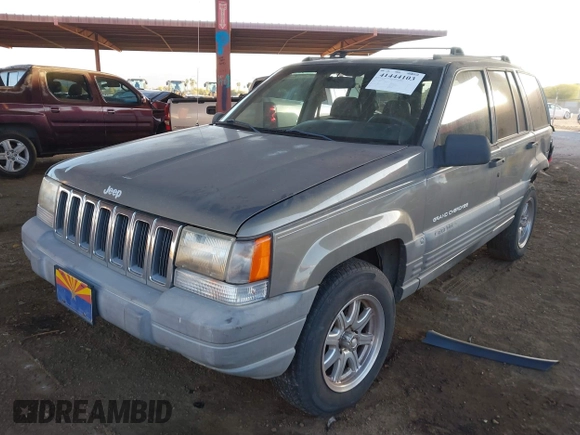 1998 Jeep Grand Cherokee Laredo with VIN 1J4GZ58S9WC136684, listed as a IAAI auction lot 41444103 with 1 mi miles. Bid and sale history available at carsss.com. Image 2.
