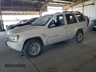 2002 Jeep Grand Cherokee Limited z VIN 1J4GW58N02C235939, wystawiony jako Copart lot #66716925 z przebiegiem Nie podano mil oraz Czysty tytuł • Clean title. Historia ofert i sprzedaży dostępna na DreamBid. Obrazek 1.