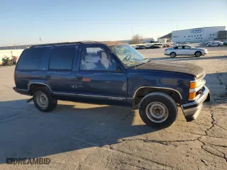 1998 Chevrolet Tahoe with VIN 1GNEC13R8WJ313742, listed as a Copart auction lot 86065574 with 201,120 mi miles and Salvage Title. Bid and sale history available at carsss.com. Image 4.