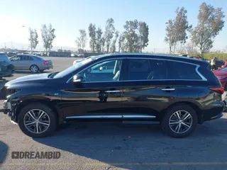2019 Infiniti QX60 Luxe with VIN 5N1DL0MN0KC502373, listed as a IAAI auction lot 41646327 with 69,250 mi miles and . Bid and sale history available at DreamBid. Image 15.