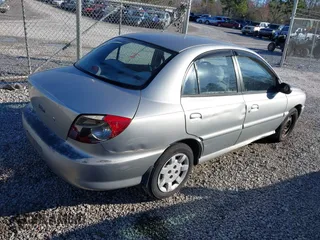 2002 Kia Rio with VIN KNADC123826198670, listed as a IAAI auction lot 41643316 with 1 mi miles. Bid and sale history available at carsss.com. Image 4.
