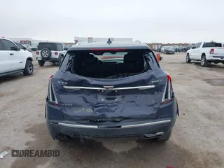 2024 Cadillac XT5 FWD Premium Luxury with VIN 1GYKNCR47RZ755652, listed as a IAAI auction lot 41512069 with 10,243 mi miles. Bid and sale history available at carsss.com. Image 16.